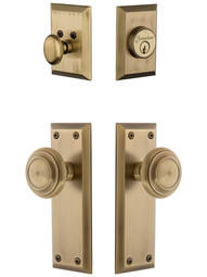 Grandeur Fifth-Avenue Entry Door Set, Keyed Alike with Circulaire Knobs in Antique Brass.